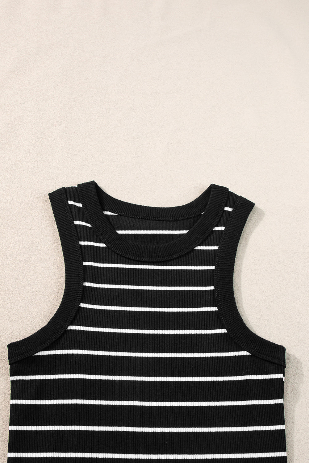 Close-up of the black and white striped pattern detail on the tank mini dress.