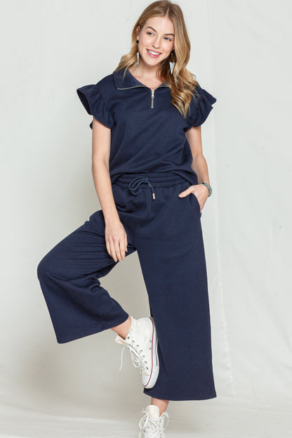 Black textured ruffle cap sleeve top and wide-leg pants set: comfortable enough to wear all day long.