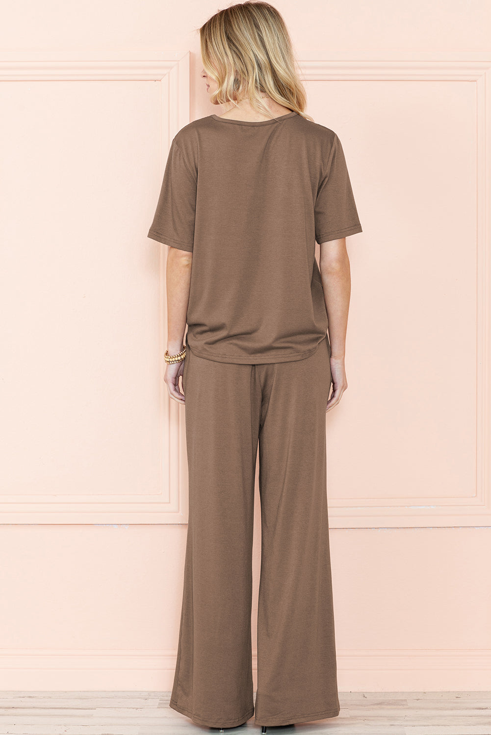 Model wearing a smoke gray t-shirt and wide-leg pants set, showcasing the comfortable and coordinated look (front view).