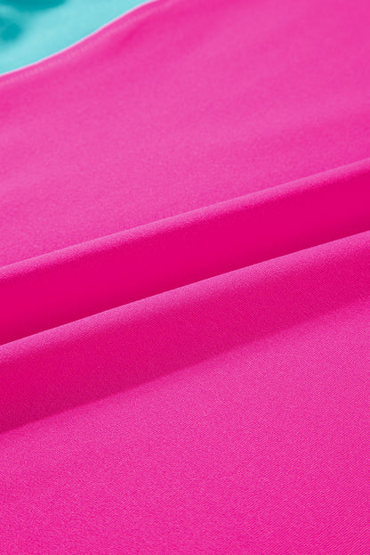 Close-up of the side pockets on the strawberry pink pants, adding functionality.