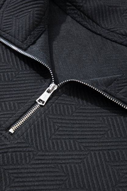 Black textured fabric: lightweight and breathable for all-day comfort.