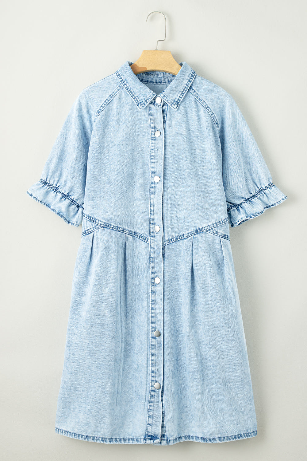 Blue mineral washed denim dress with ruffled short sleeves and pockets: perfect for a casual summer day.