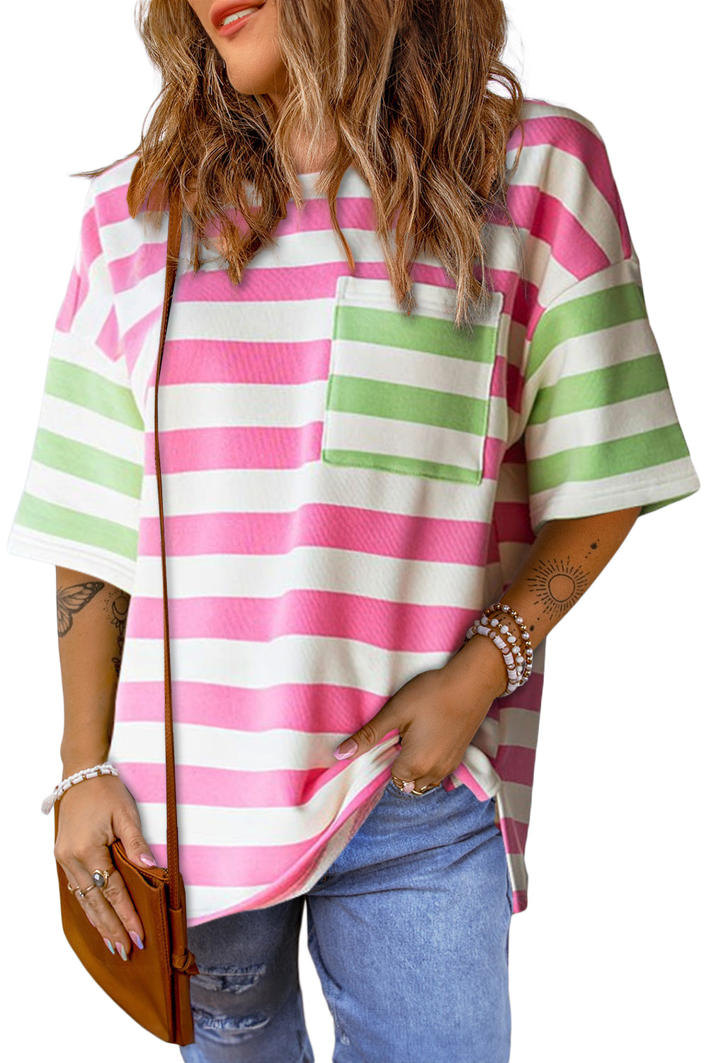 Close-up of the patch pocket on the chest of the pink striped t-shirt.