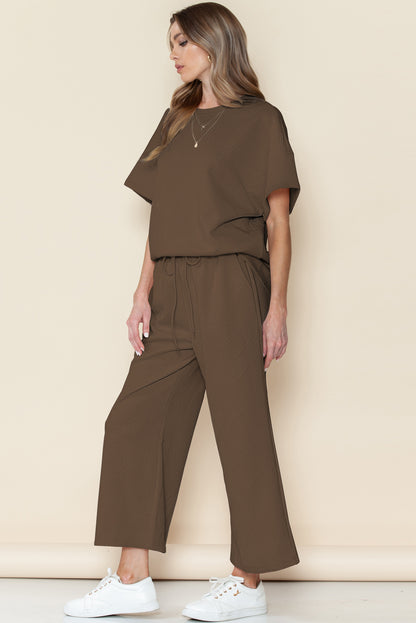 Black textured T-shirt and drawstring pants set: find your perfect fit!