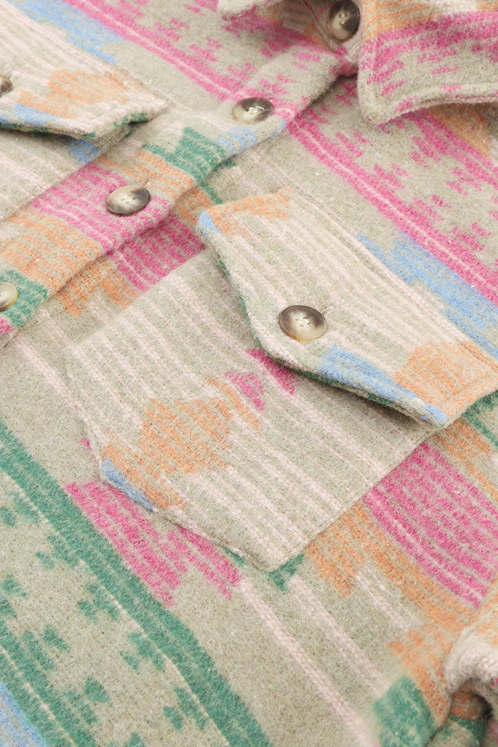 Close-up of the collar and lapels on the multicolored geometric jacket.