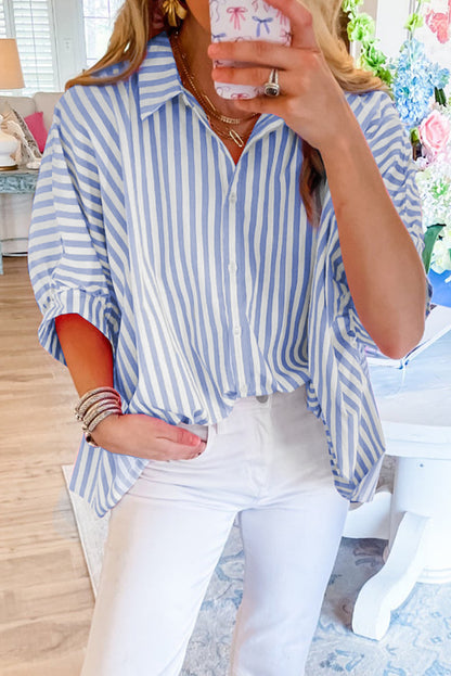 Sky blue striped oversized blouse with dolman sleeves (wholesale clothing).