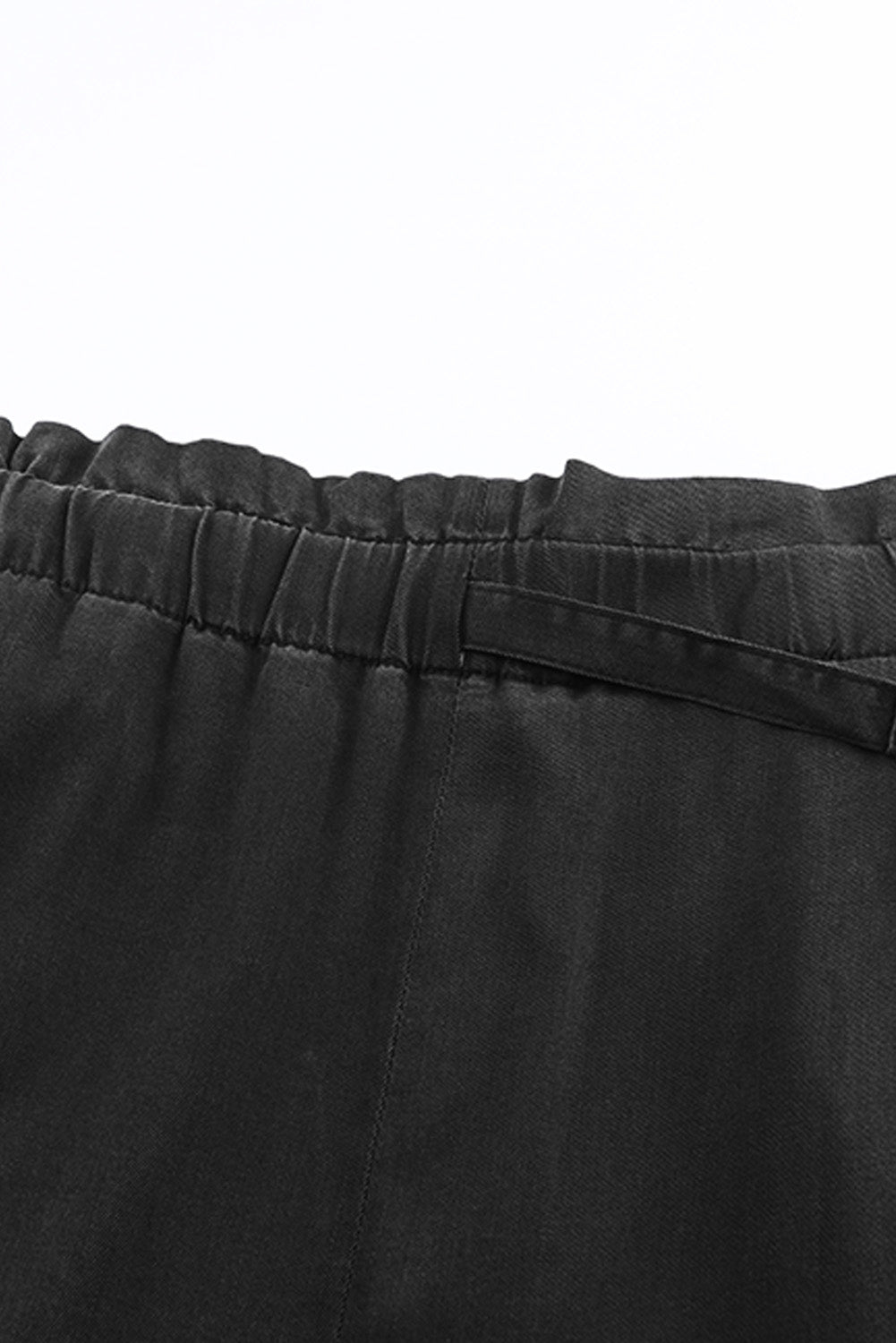 Black high-waisted wide-leg pants with subtle stitching details.