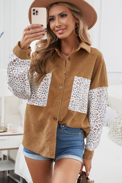 Model wearing a brown button up colorblock pocket corduroy shacket (front view).