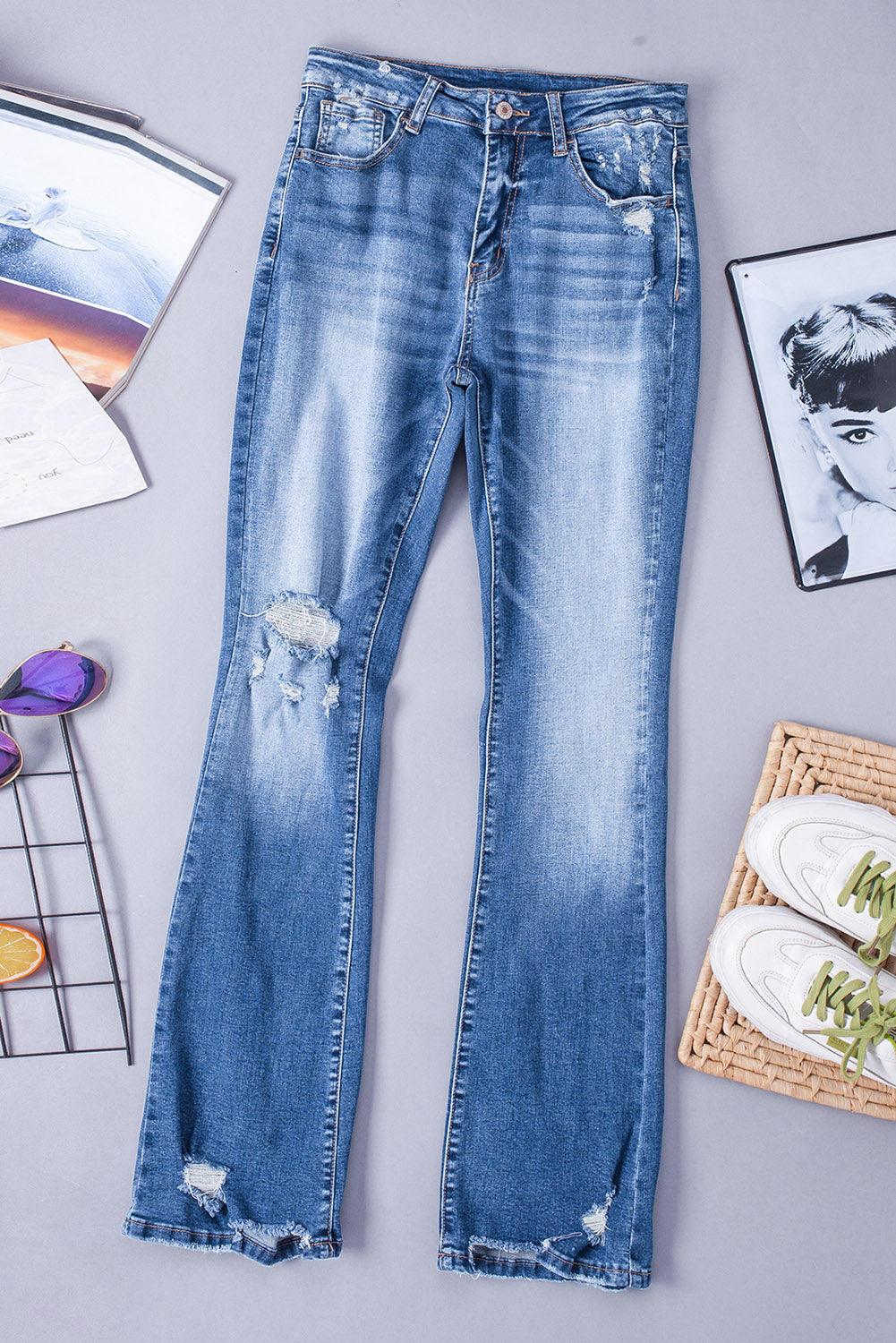 Dark blue ripped raw hem high waist flare jeans styled for a casual outing (text overlay: "Casual Chic"