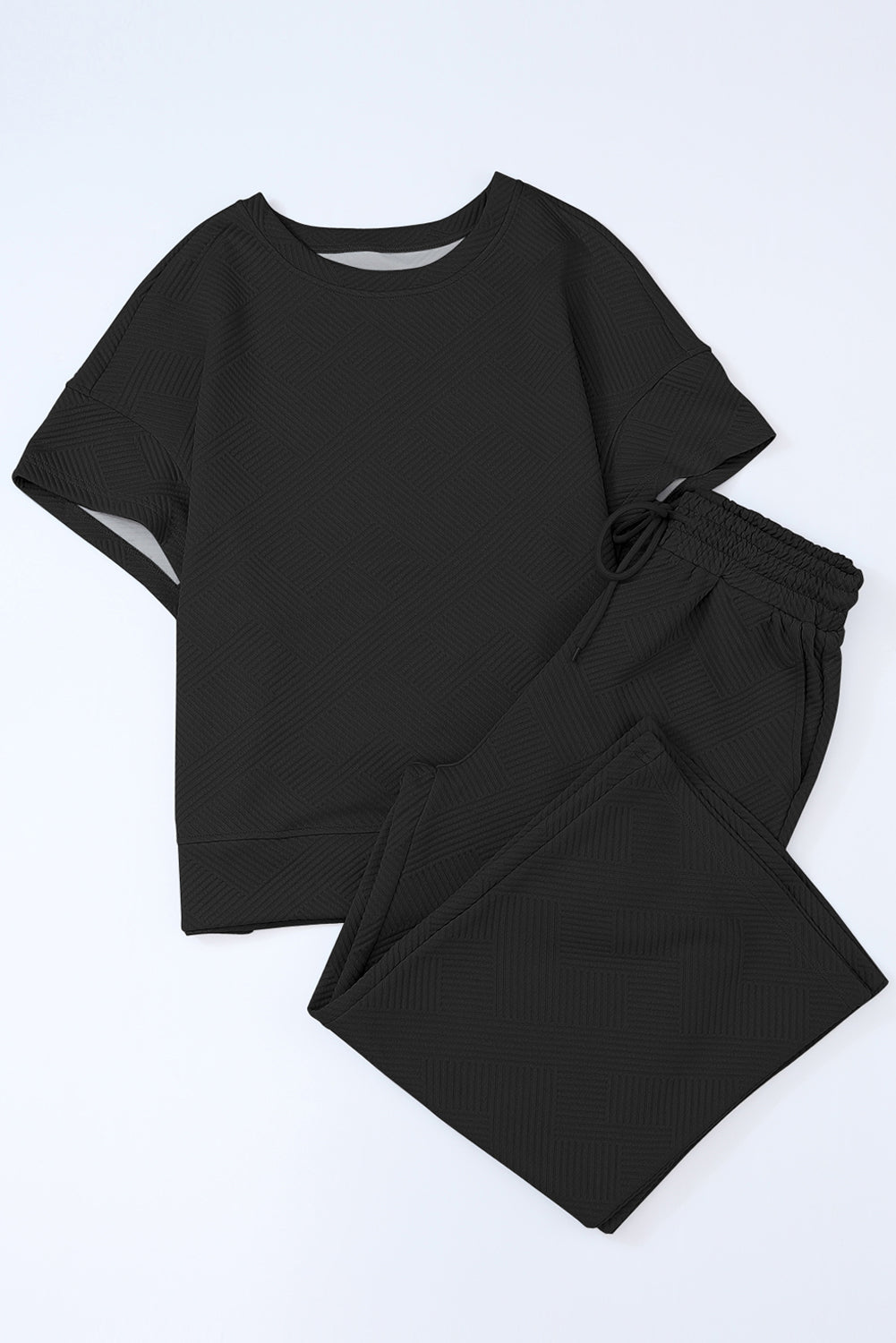 Black textured T-shirt (size chart with measurements in centimeters).