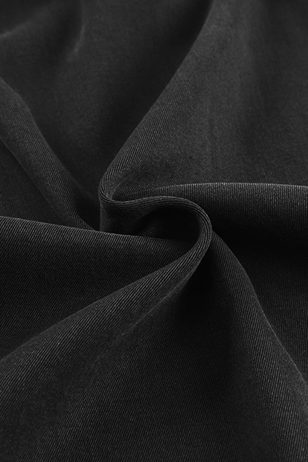 Close-up of the comfortable elastic waistband on black pants.  pen_spark