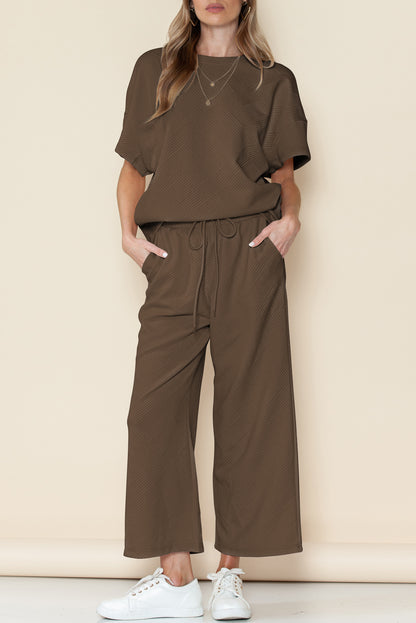 Black textured T-shirt and drawstring pants set: a gift they'll love