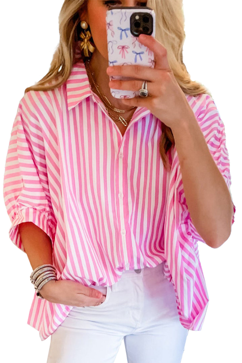 Flat lay image of the sky blue striped blouse with other clothing items in similar colors or styles, suggesting outfit ideas.