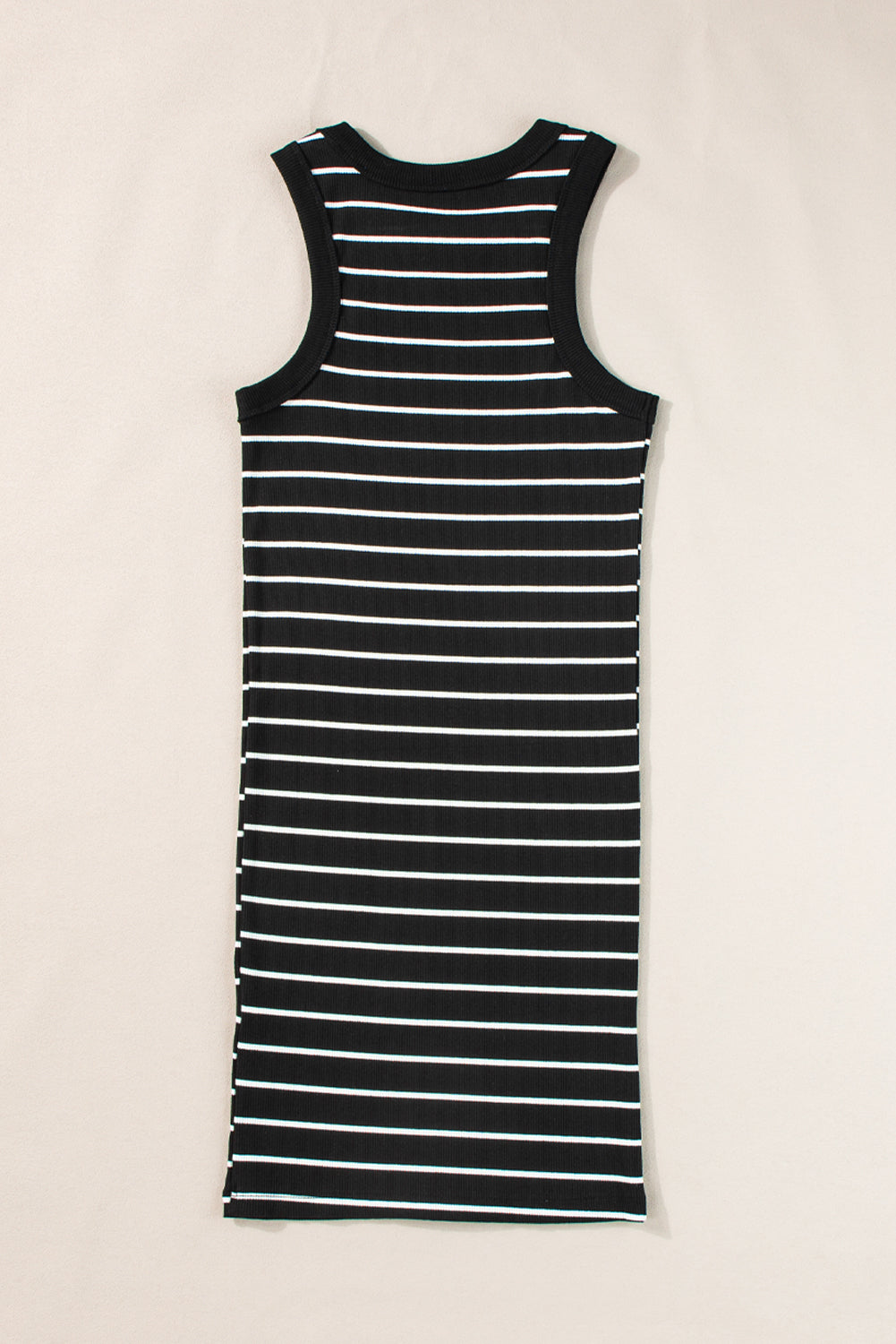 Black and white striped tank mini dress with a relaxed fit around the bust.